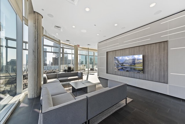 600 N Fairbanks Ct Unit 2503, Chicago, IL 60611 - community lobby with a wall of windows, a city view, and recessed lighting