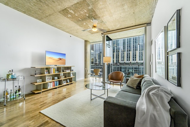600 N Fairbanks Ct Unit 2503, Chicago, IL 60611 - living room with healthy amount of natural light, wood finished floors, expansive windows, and a ceiling fan