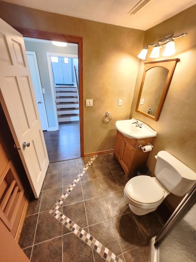 271 E Cleburne Ave, Bartlett, IL 60103 - bathroom with tile patterned flooring, toilet, vanity, and baseboards