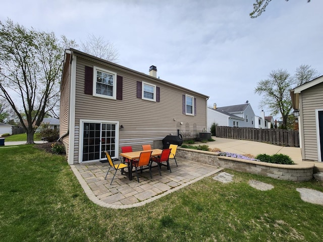 271 E Cleburne Ave, Bartlett, IL 60103 - back of house featuring a patio area, a chimney, and cooling unit