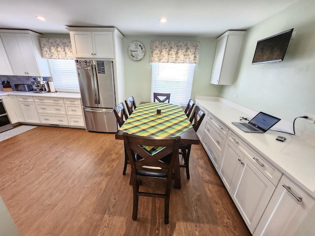 271 E Cleburne Ave, Bartlett, IL 60103 - kitchen featuring freestanding refrigerator, dark wood-style floors, plenty of natural light, light countertops, and recessed lighting