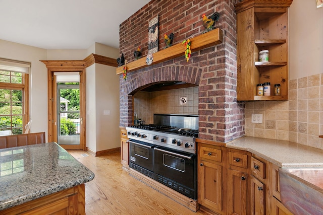 10731 Somonauk Rd, Hinckley, IL 60520 - kitchen with double oven range, open shelves, decorative backsplash, and light wood-type flooring