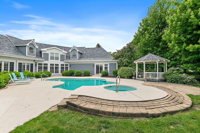 10731 Somonauk Rd, Hinckley, IL 60520 - swimming pool featuring a gazebo, an in-ground hot tub, a patio area, and french doors