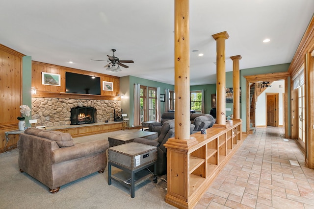 10731 Somonauk Rd, Hinckley, IL 60520 - living area with decorative columns, healthy amount of natural light, a ceiling fan, recessed lighting, and a stone fireplace