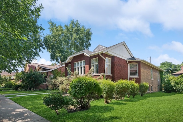 3622 N Avers Ave, Chicago, IL 60618 - view of front of house featuring a front lawn and brick siding