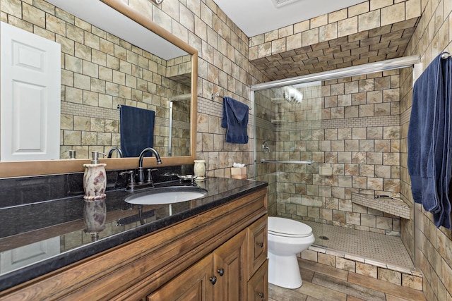 18120 Waterside Cir Unit 18120, Orland Park, IL 60467 - bathroom featuring tile walls, vanity, and a stall shower