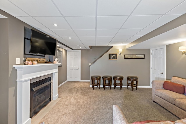 18120 Waterside Cir Unit 18120, Orland Park, IL 60467 - living room featuring light carpet, a tile fireplace, recessed lighting, and a drop ceiling