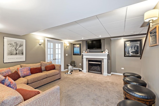 18120 Waterside Cir Unit 18120, Orland Park, IL 60467 - carpeted living area featuring a fireplace and french doors