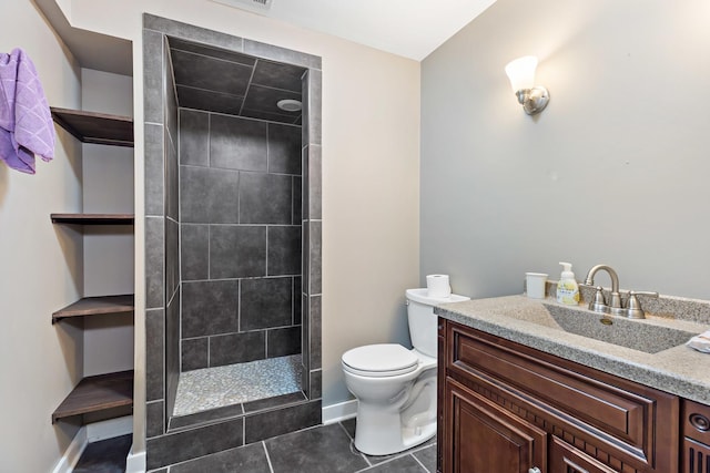 18120 Waterside Cir Unit 18120, Orland Park, IL 60467 - bathroom featuring tiled shower, vanity, and tile patterned flooring