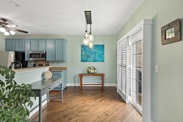 18120 Waterside Cir Unit 18120, Orland Park, IL 60467 - kitchen featuring stainless steel appliances, a ceiling fan, blue cabinets, wood finished floors, and recessed lighting