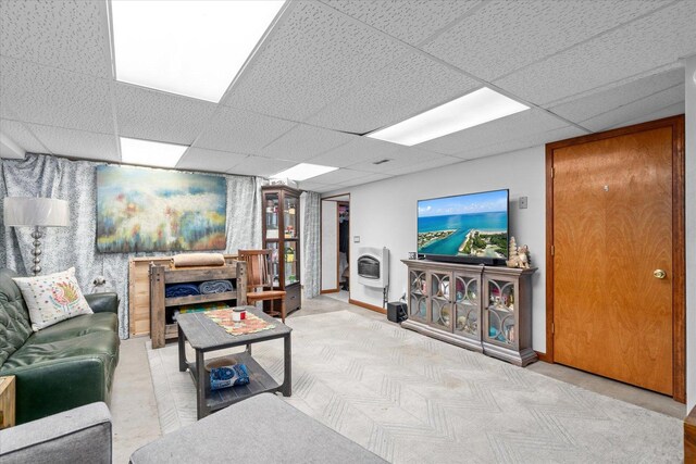 4461 N Il State Route 23, Leland, IL 60531 - living area with a drop ceiling, baseboards, and heating unit