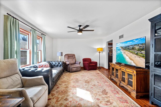 4461 N Il State Route 23, Leland, IL 60531 - living area with wood finished floors and ceiling fan