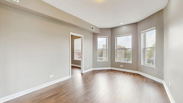 6347 S Drexel Ave, Chicago, IL 60637 - unfurnished room with dark wood-style floors and baseboards