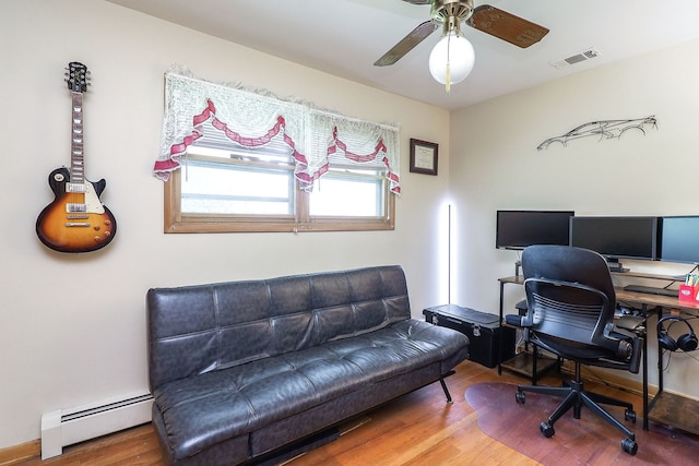 1320 Adeline Ct, Aurora, IL 60505 - office space featuring a baseboard radiator, ceiling fan, and wood finished floors