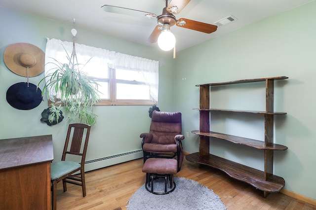 1320 Adeline Ct, Aurora, IL 60505 - living area featuring a baseboard radiator, wood finished floors, and a ceiling fan