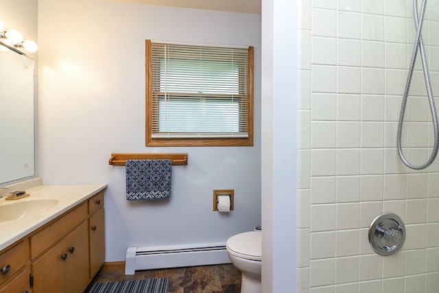 1320 Adeline Ct, Aurora, IL 60505 - bathroom with baseboard heating, vanity, a tile shower, toilet, and baseboards