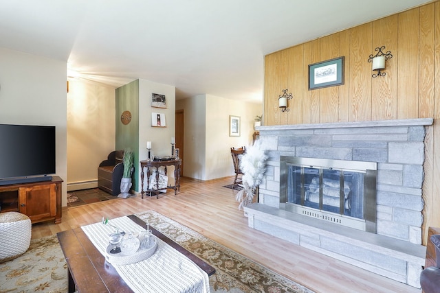 1320 Adeline Ct, Aurora, IL 60505 - living room featuring a fireplace, wood finished floors, and baseboard heating