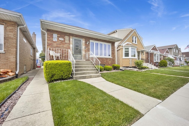 5548 S Kedvale Ave, Chicago, IL 60629 - bungalow with brick siding, covered porch, a front lawn, and a residential view