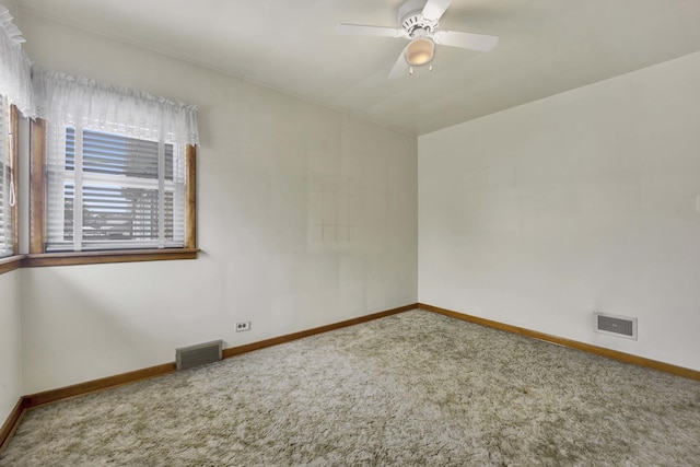 5548 S Kedvale Ave, Chicago, IL 60629 - carpeted empty room featuring baseboards and a ceiling fan