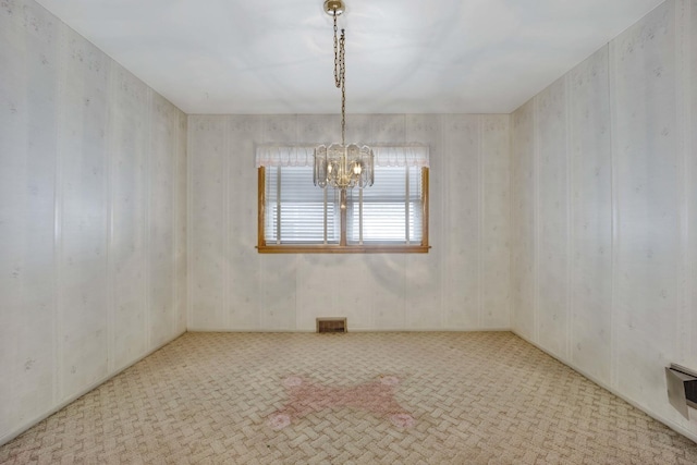 5548 S Kedvale Ave, Chicago, IL 60629 - carpeted empty room featuring a chandelier