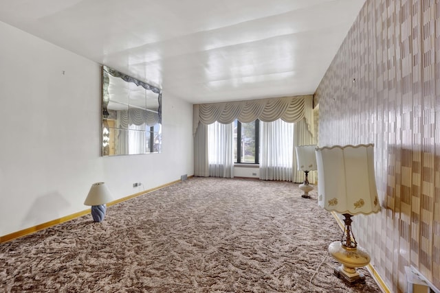 5548 S Kedvale Ave, Chicago, IL 60629 - carpeted spare room with baseboards and wallpapered walls