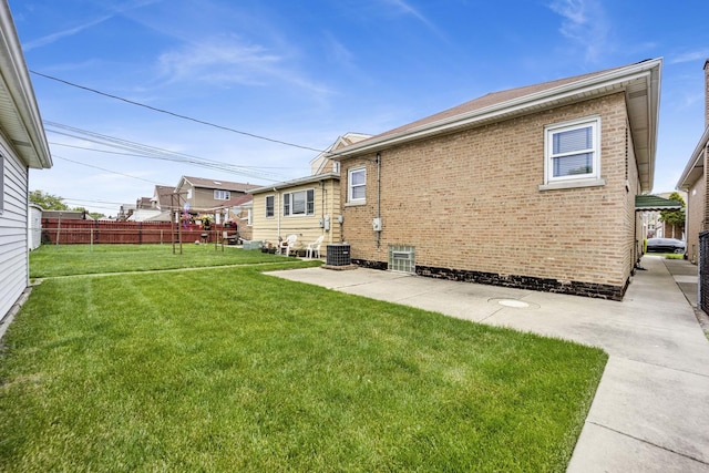 5548 S Kedvale Ave, Chicago, IL 60629 - back of house featuring brick siding and a patio area