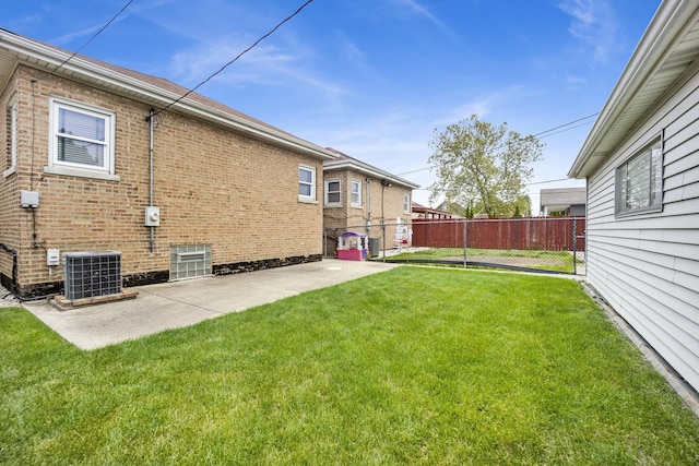 5548 S Kedvale Ave, Chicago, IL 60629 - view of yard with central AC unit and a patio