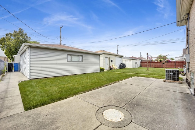 5548 S Kedvale Ave, Chicago, IL 60629 - back of house with a patio area and central air condition unit