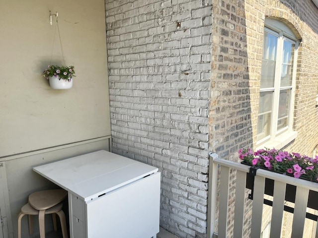 208 N Oak Park Ave Unit 3Jj, Oak Park, IL 60302 - exterior view of brick siding and fridge