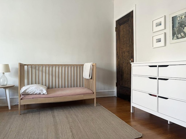 208 N Oak Park Ave Unit 3Jj, Oak Park, IL 60302 - bedroom with wood finished floors and baseboards