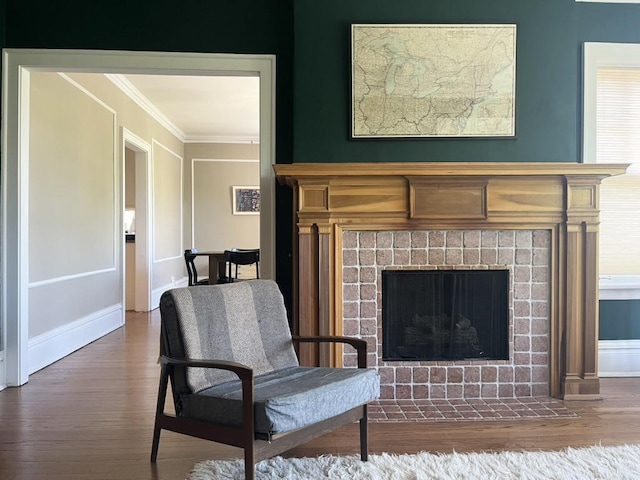 208 N Oak Park Ave Unit 3Jj, Oak Park, IL 60302 - living area with wood finished floors, ornamental molding, a tile fireplace, and baseboards