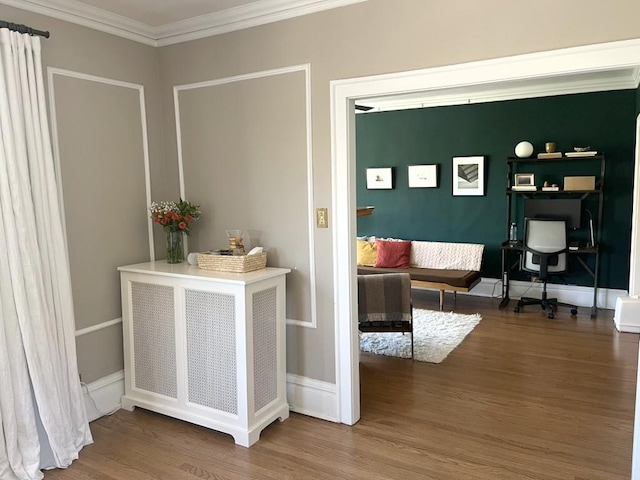 208 N Oak Park Ave Unit 3Jj, Oak Park, IL 60302 - living area with ornamental molding, wood finished floors, radiator heating unit, and baseboards