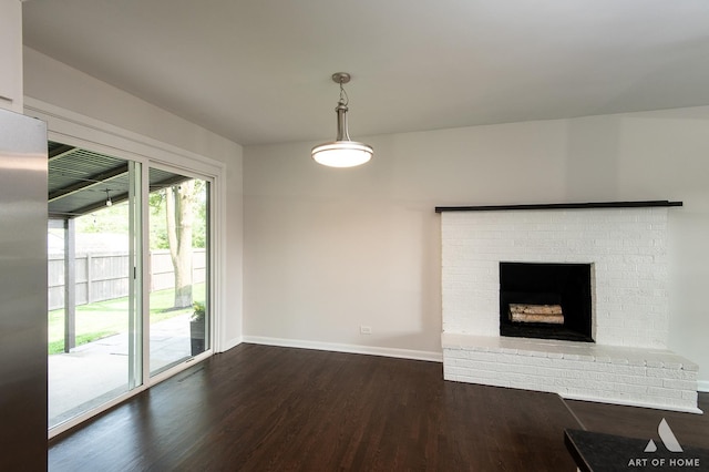 5700 Grange Ave, Oak Forest, IL 60452 - unfurnished living room with dark wood finished floors, baseboards, and a fireplace