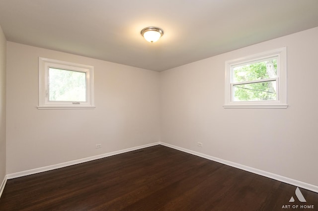 5700 Grange Ave, Oak Forest, IL 60452 - unfurnished room featuring baseboards and dark wood-style flooring