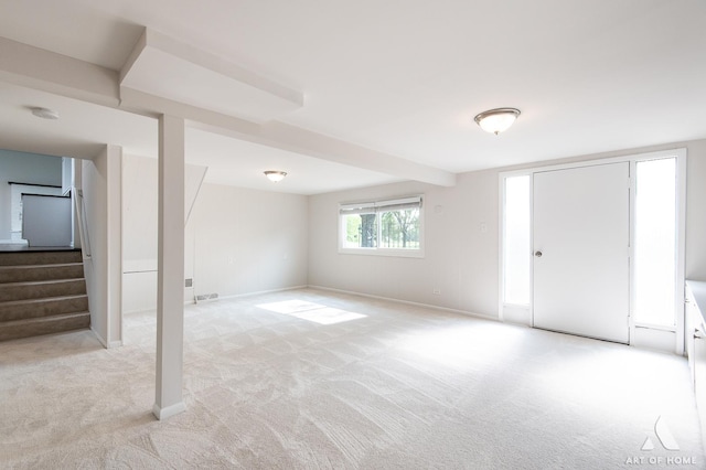5700 Grange Ave, Oak Forest, IL 60452 - below grade area with light carpet, stairway, and baseboards