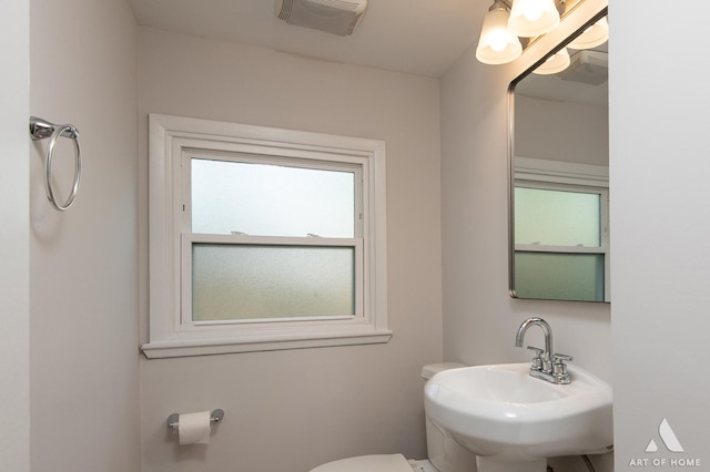 5700 Grange Ave, Oak Forest, IL 60452 - bathroom featuring toilet and a sink