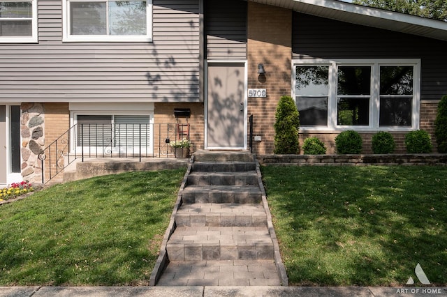5700 Grange Ave, Oak Forest, IL 60452 - entrance to property featuring brick siding and a lawn