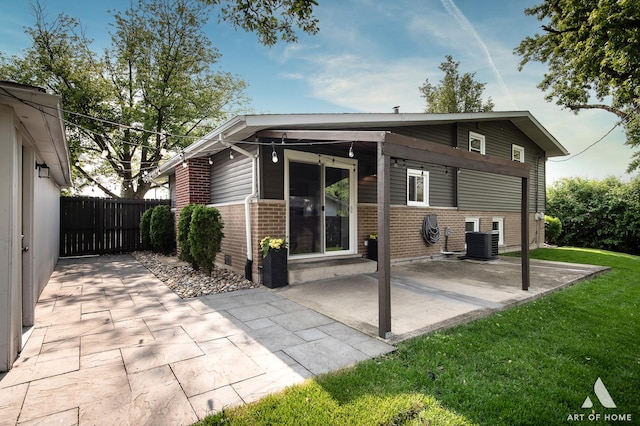 5700 Grange Ave, Oak Forest, IL 60452 - rear view of house featuring brick siding, cooling unit, and a patio area