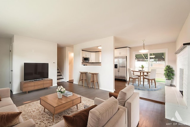 5700 Grange Ave, Oak Forest, IL 60452 - living room featuring wood finished floors, stairs, and baseboards