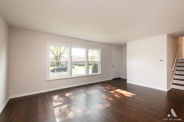 5700 Grange Ave, Oak Forest, IL 60452 - unfurnished living room with stairway, dark wood-style floors, and baseboards
