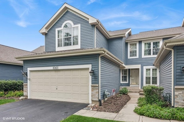 1063 Ridgefield Cir, Carol Stream, IL 60188 - traditional home featuring a garage and driveway