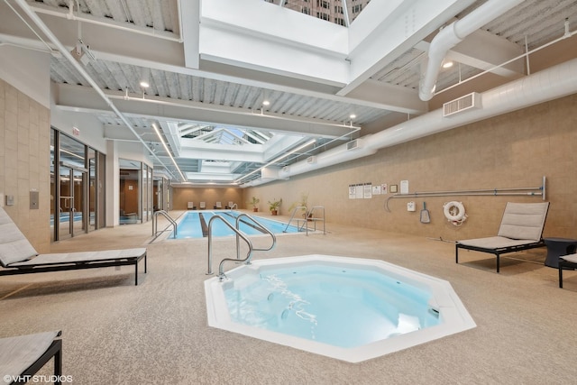 222 N Columbus Dr Unit 2408, Chicago, IL 60601 - indoor pool featuring a skylight and an indoor hot tub