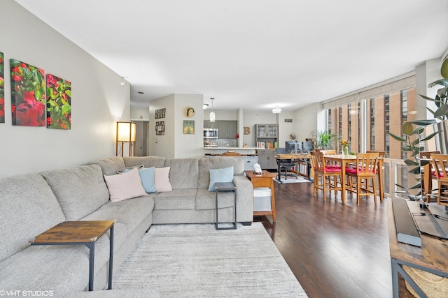222 N Columbus Dr Unit 2408, Chicago, IL 60601 - living area featuring dark wood-style flooring