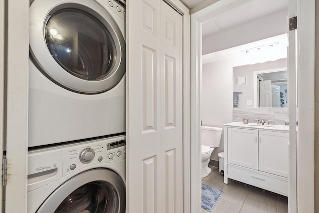 5235 James Ln Unit 1202, Crestwood, IL 60418 - laundry room featuring estacked washer and dryer