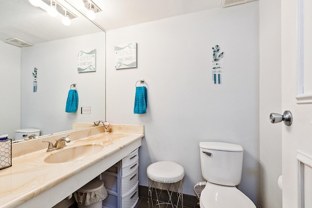 5235 James Ln Unit 1202, Crestwood, IL 60418 - half bathroom featuring toilet and vanity