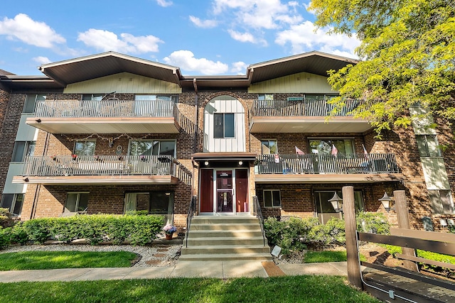 5235 James Ln Unit 1202, Crestwood, IL 60418 - view of front of house with a balcony and brick siding