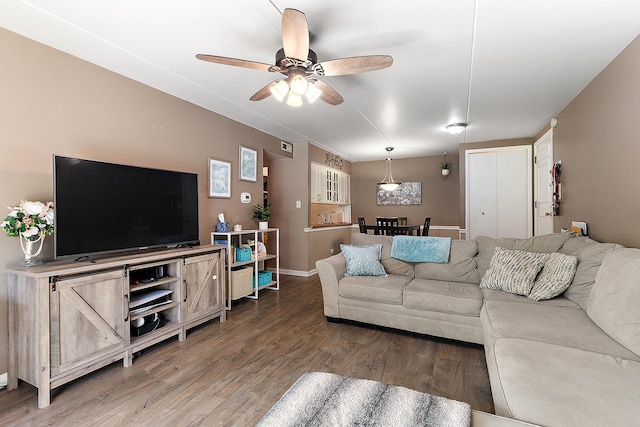 5235 James Ln Unit 1202, Crestwood, IL 60418 - living room featuring ceiling fan, wood finished floors, and baseboards