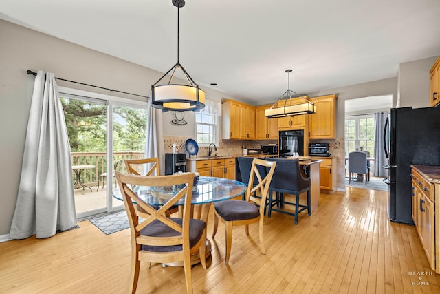 605 Birch Ln, Fox River Grove, IL 60021 - dining space featuring light wood-style floors and healthy amount of natural light