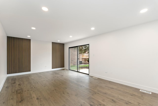 7723 W 157th St, Orland Park, IL 60462 - empty room with recessed lighting, baseboards, and wood finished floors