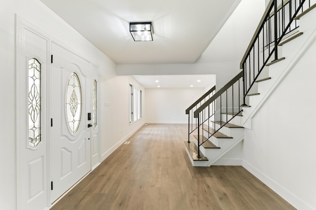 7723 W 157th St, Orland Park, IL 60462 - entrance foyer with baseboards, wood finished floors, stairway, and recessed lighting